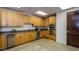 Well-equipped kitchenette with stainless steel appliances and ample cabinet space at 331 Cleveland St # 402, Clearwater, FL 33755
