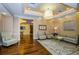Cozy lobby with comfortable seating, decorative rug, and television at 331 Cleveland St # 402, Clearwater, FL 33755