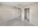 Bedroom featuring neutral walls, tiled floors, ceiling fan and closet at 34477 Poinsettia Pl, Dade City, FL 33523