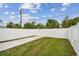 Spacious, fenced backyard featuring a well-maintained lawn and ample space for outdoor activities at 3455 17Th S Ave, St Petersburg, FL 33711