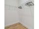 White closet space with white wire shelving and vinyl flooring, ready for organization at 3455 17Th S Ave, St Petersburg, FL 33711