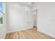 Bright bedroom features sleek, continuous baseboards and light, wood-look flooring at 3457 17Th S Ave, St Petersburg, FL 33711
