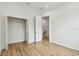 Bright bedroom featuring natural light and an open closet with modern hardware at 3457 17Th S Ave, St Petersburg, FL 33711