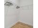 Walk-in closet features integrated shelving for organized storage solutions at 3457 17Th S Ave, St Petersburg, FL 33711