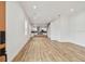 Open-concept living space featuring modern wood floors and recessed lighting at 3457 17Th S Ave, St Petersburg, FL 33711