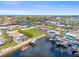 Waterfront home with boat dock and lift in a community with canals, houses, and ocean access at 3506 Seaway Dr, New Port Richey, FL 34652