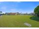 Large grassy lot with water access and views of nearby canal homes, great outdoor space at 3506 Seaway Dr, New Port Richey, FL 34652