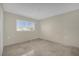 Bedroom with tile floors and a window allowing ample light at 3506 Seaway Dr, New Port Richey, FL 34652