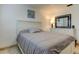 Bedroom featuring a bed, a dresser, and neutral wall colors at 3506 Seaway Dr, New Port Richey, FL 34652