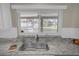 Kitchen sink with granite countertops, with a view of a screened lanai and pool at 3506 Seaway Dr, New Port Richey, FL 34652