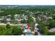 Aerial image displaying the home with a pool, showcasing its location within the neighborhood at 3647 Lake St George Dr, Palm Harbor, FL 34684