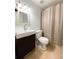 Updated bathroom features modern fixtures, vanity and shower at 3647 Lake St George Dr, Palm Harbor, FL 34684