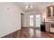 Bright kitchen with wood floors and glass doors leading to the lanai at 3647 Lake St George Dr, Palm Harbor, FL 34684