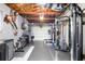 Finished basement with home gym and garage door at 416 Graham Dr, Clearwater, FL 33765
