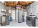 Basement laundry room with washer and dryer at 416 Graham Dr, Clearwater, FL 33765