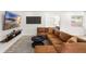 Comfortable living room features a plush sectional sofa, perfect for relaxing at 416 Graham Dr, Clearwater, FL 33765
