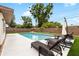 Backyard pool with lounge chairs at 416 Graham Dr, Clearwater, FL 33765