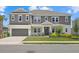 Beautiful two-story home featuring a manicured front yard and attached two-car garage at 4423 Pond Brook Ct, Bradenton, FL 34211