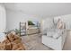 Inviting living room with staircase, comfortable seating, and modern decor at 4423 Pond Brook Ct, Bradenton, FL 34211