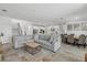Open-concept living space with kitchen, dining, and living area, perfect for entertaining at 4423 Pond Brook Ct, Bradenton, FL 34211