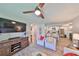 Spacious living room that flows into the open kitchen and dining area, perfect for entertaining at 5108 26Th Street W Ct, Bradenton, FL 34207