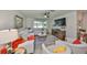 Cozy living room with a large window, ceiling fan, and stylish furniture at 5108 26Th Street W Ct, Bradenton, FL 34207