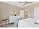 This bedroom features soft colors, dresser, and ensuite bathroom at 5128 Dockyard Pl, Land O Lakes, FL 34638