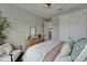 Bedroom with light colored walls, natural light, and modern furnishings at 5601 Limelight Dr, Apollo Beach, FL 33572