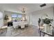 Bright bedroom with large windows, neutral tones, and stylish furnishings at 5601 Limelight Dr, Apollo Beach, FL 33572