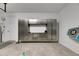 This garage boasts storage and an area for various gear, plus a large, clean floor at 5601 Limelight Dr, Apollo Beach, FL 33572