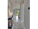 Hallway with a console table and a view of the backyard at 5601 Limelight Dr, Apollo Beach, FL 33572