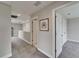 Neutral-toned hallway with carpet, recessed lighting, and doorways at 5601 Limelight Dr, Apollo Beach, FL 33572