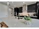 Kitchen island with sink and goose neck faucet; stainless appliances and ample storage space at 5601 Limelight Dr, Apollo Beach, FL 33572