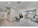 Spacious loft with comfortable seating, bright lighting, and stylish decor at 5601 Limelight Dr, Apollo Beach, FL 33572