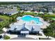 Community pool featuring a resort-style pool, sundeck, splash pad, and gathering pavilion in a residential neighborhood at 5601 Limelight Dr, Apollo Beach, FL 33572