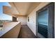 Exterior view of unit entrance with balcony overlooking the city and the water at 7050 Sunset S Dr # 912, South Pasadena, FL 33707