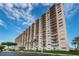 An impressive high-rise condo building with many balconies and stunning curb appeal at 7050 Sunset S Dr # 912, South Pasadena, FL 33707