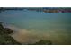 Serene waterfront view showcasing clear water and lush mangroves, creating a tranquil setting at 7050 Sunset S Dr # 912, South Pasadena, FL 33707
