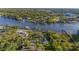 Scenic aerial perspective of a community with waterfront properties and river access at 8013 Linesider Dr, Riverview, FL 33578