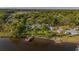 Gorgeous aerial view of waterfront home and dock with river access at 8013 Linesider Dr, Riverview, FL 33578