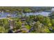 A beautiful waterfront estate featuring lush landscaping and river views at 8013 Linesider Dr, Riverview, FL 33578