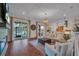 Spacious living room with hardwood floors, lake views, and modern decor at 8013 Linesider Dr, Riverview, FL 33578