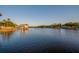 Stunning waterfront view with a private dock, boat lift, and serene water for boating and recreation at 8013 Linesider Dr, Riverview, FL 33578