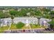 Overhead view of condos featuring mature trees, turquoise accents, and well-kept landscaping at 8533 110Th St # 207, Seminole, FL 33772