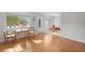 Light-filled living area with neutral walls and hardwood flooring at 8533 110Th St # 207, Seminole, FL 33772