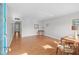 Neutral living area boasting light hardwood floors and natural lighting at 8533 110Th St # 207, Seminole, FL 33772