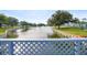 Scenic view of a tranquil pond with decorative fountains and manicured landscaping at 8533 110Th St # 207, Seminole, FL 33772