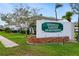 Seminole Garden Apartments sign with brick planter and neatly manicured lawn at 8533 110Th St # 207, Seminole, FL 33772