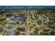 Aerial view of a neighborhood with residential homes and tree-lined streets at 9101 86Th Ave, Seminole, FL 33777