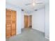 Bedroom with wood closet doors and light-colored walls at 9101 86Th Ave, Seminole, FL 33777